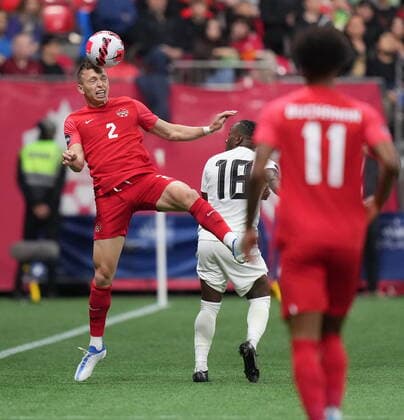 June 9, 2022, VANCOUVER, BC, CANADA: Canada s Alistair Johnston (2) and Curacao s Elson Hooi (18) vie for the ball during the first half of a CONCACAF Nations League soccer match, in Vancouver, on Thursday, June 9, 2022. Canada News - June 9, 2022  - ZUMAc35_ 20220609_zaf_c35_167 Copyright: xDarrylxDyckx
