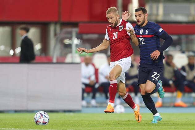 SOCCER - NL, AUT vs FRA VIENNA,AUSTRIA,10.JUN.22 - SOCCER - UEFA Nations League, OEFB international match, Länderspiel, Nationalmannschaft Austria vs France. Image shows Konrad Laimer (AUT) and Theo Hernandez (FRA)  GEPAxpictures xGEPAxpictures xPhilippxBrem