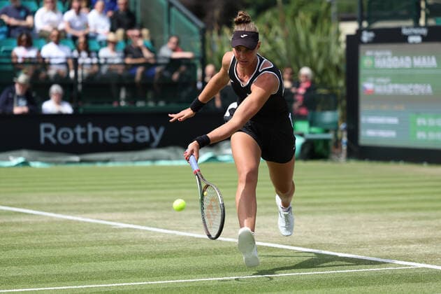 11th June 2022; Nottingham Tennis Centre, Nottingham, England: Rothesay Open Nottingham Lawn Tennis tournament; Beatriz Haddad Maia plays a volley in her match against Tereza Martincova womens singles semi-final  ActionPlus12398345 ShaunxBrooks