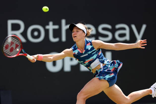 11th June 2022; Nottingham Tennis Centre, Nottingham, England: Rothesay Open Nottingham Lawn Tennis tournament; Viktorija Golubic returns a serve from Alison Riske  ActionPlus12398556 ShaunxBrooks
