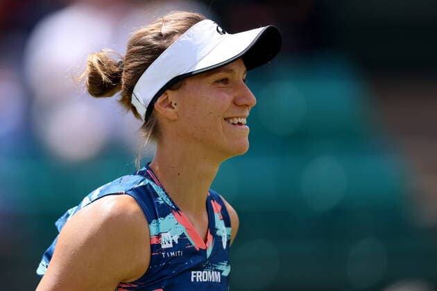 11th June 2022; Nottingham Tennis Centre, Nottingham, England: Rothesay Open Nottingham Lawn Tennis tournament; Viktorija Golubic smiles as she holds her serve with Alison Riske  ActionPlus12398558 ShaunxBrooks