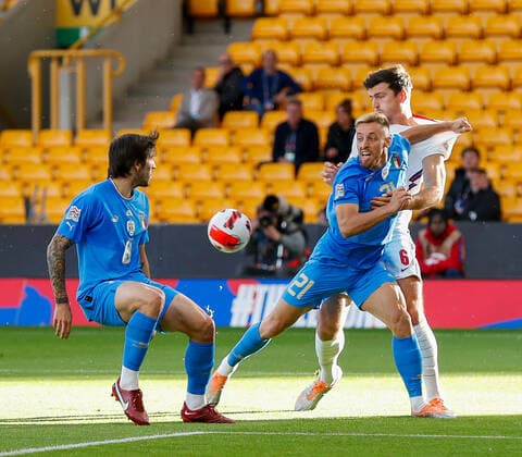 England v Italy UEFA Nations League Harry Maguire of England battles with Davide Frattesi of Italy during the UEFA Nations League match between England and Italy at Molineux, Wolverhampton Content Not Available For UK Newspapers Copyright: xPaulxChestertonx FIL-17006-0036 UK Newspapers OUT