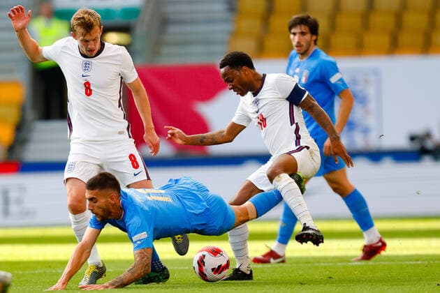 11th June 2022; Molineux Stadium, Wolverhampton, West Midlands, England; UEFA Nations League Football, England versus Italy; Raheem Sterling of England tackles Degnand Wilfried Gnonto of Italy  ActionPlus12398941 GrahamxWilson