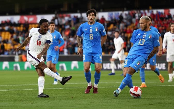 Wolverhampton, England, 11th June 2022. Raheem Sterling of England shoots past Federico Dimarco of Italy during the UEFA Nations League match at Molineux, Wolverhampton. Picture credit should read: Darren Staples Sportimage EDITORIAL USE ONLY. No use with unauthorised audio, video, data, fixture lists, club league logos or live services. Online in-match use limited to 120 images, no video emulation. No use in betting, games or single club league player publications. SPI-1732-0067