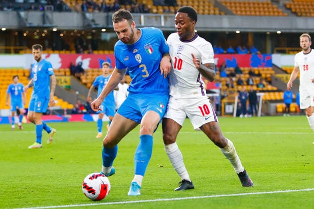 11th June 2022; Molineux Stadium, Wolverhampton, West Midlands, England; UEFA Nations League Football, England versus Italy; Federico Gatti of Italy holds off Raheem Sterling of England  ActionPlus12399027 GrahamxWilson