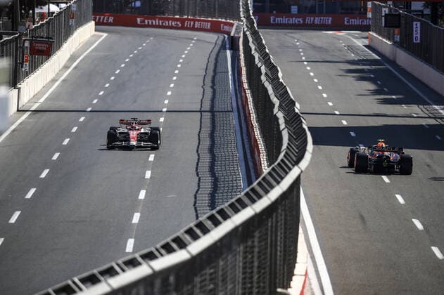 77 BOTTAS Valtteri (fin), Alfa Romeo F1 Team ORLEN C42, action 11 PEREZ Sergio (mex), Red Bull Racing RB18, action during the Formula 1 Azerbaijan Grand Prix 2022, 8th round of the 2022 FIA Formula One World Championship, WM, Weltmeisterschaft on the Baku City Circuit, from June 10 to 12, 2022 in Baku, Azerbaijan - F1 - AZERBAIJAN GRAND PRIX 2022 - RACE DPPI Panoramic  _B3_4267
