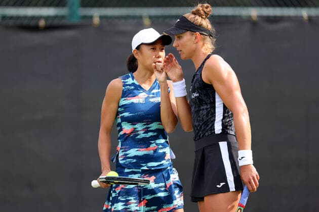 11th June 2022; Nottingham Tennis Centre, Nottingham, England: Rothesay Open Nottingham Lawn Tennis tournament; Beatriz Haddad Maia speaks with Shuai Zhangin during the womens doubles semi finals  ActionPlus12399174 ShaunxBrooks