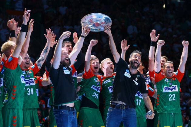 12 06 2022, xtgx, handball, Liqui Moly HBL, SC Magdeburg Rhein Neckar Loewen emspor v l SC Magdeburg celebrates winning the German championship, award ceremony, Yves Grafenhorst Magdeburg, co-trainer and Bennet Wiegert Magdeburg, coach with championship trophy Magdeburg.