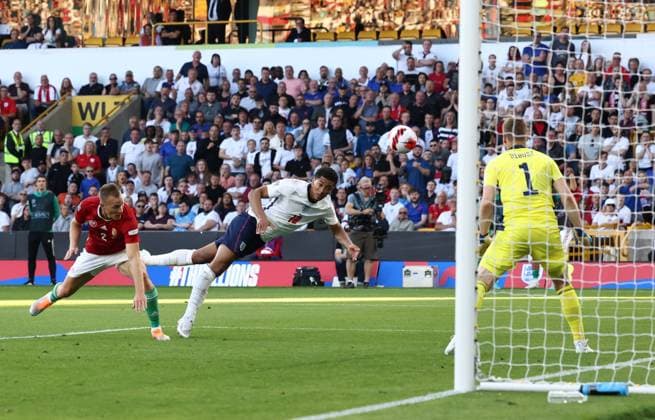 Wolverhampton, England, 14th June 2022. Jude Bellingham of England attempts to make contact during the UEFA Nations League match at Molineux, Wolverhampton. Picture credit should read: Darren Staples Sportimage EDITORIAL USE ONLY. No use with unauthorised audio, video, data, fixture lists, club league logos or live services. Online in-match use limited to 120 images, no video emulation. No use in betting, games or single club league player publications. SPI-1734-0047