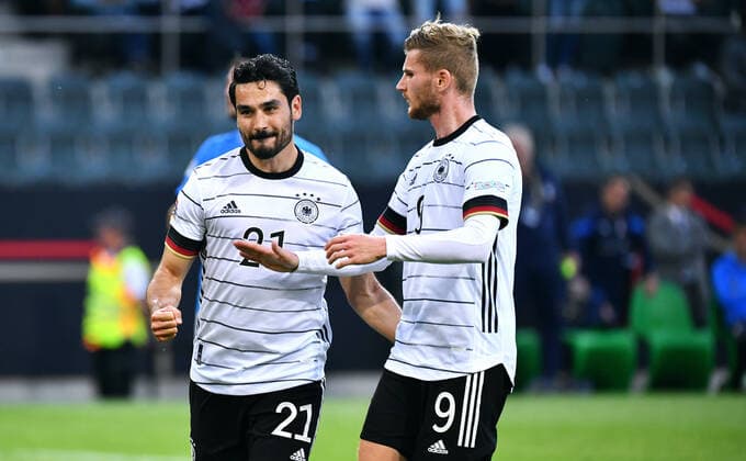 Football, UEFA Nations League, Men, Matchday 4, Borussia Park Mönchengladbach Germany white Italy blue cheering Ilkay Gündogan GER after his goal to 2 0 by penalty kick, together with Timo Werner GER cheering, joy, action DFB UEFA REGULATIONS PROHIBIT ANY USE OF PHOTOGRAPHS AS IMAGE SEQUENCES AND OR QUASI VIDEO