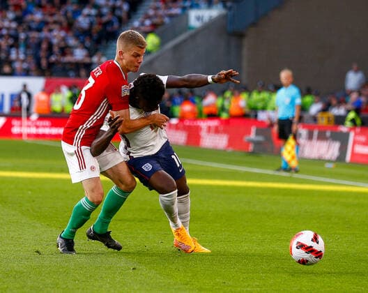England v Hungary UEFA Nations League Bukayo Saka of England and Andras Schafer of Hungary battle during the UEFA Nations League match between England and Hungary at Molineux, Wolverhampton Content Not Available For UK Newspapers Copyright: xPaulxChestertonx FIL-17013-0139 UK Newspapers OUT