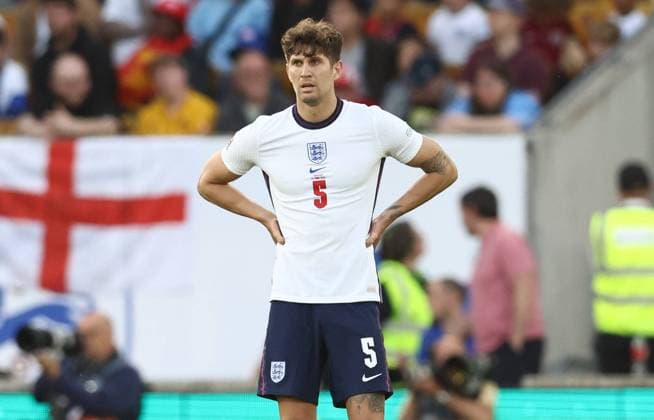 Wolverhampton, England, 14th June 2022. John Stones of England dejected following the second Hungary goal during the UEFA Nations League match at Molineux, Wolverhampton. Picture credit should read: Darren Staples Sportimage EDITORIAL USE ONLY. No use with unauthorised audio, video, data, fixture lists, club league logos or live services. Online in-match use limited to 120 images, no video emulation. No use in betting, games or single club league player publications. SPI-1734-0058