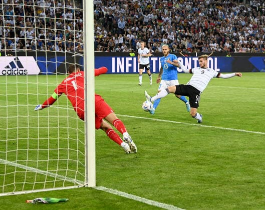Football, Men, Season 2022 2023, Nations League League A, Group 3, Matchday 4 in Moenchengladbach, Germany Italy, Timo Werner Germany scores the goal to 4 0 against goalkeeper Gianluigi Donnarumma Italy , 14 06 2022, Copyright: xMatthiasxKochx