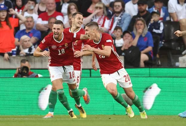 Wolverhampton, England, 14th June 2022. Roland Sallai of Hungary turns to celebrate scoring their second goal during the UEFA Nations League match at Molineux, Wolverhampton. Picture credit should read: Darren Staples Sportimage EDITORIAL USE ONLY. No use with unauthorised audio, video, data, fixture lists, club league logos or live services. Online in-match use limited to 120 images, no video emulation. No use in betting, games or single club league player publications. SPI-1734-0059