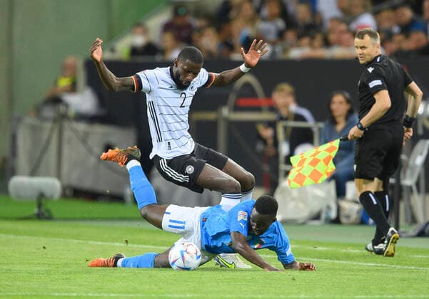 Antonio RUEDIGER GER , action, duel against Degnand Wilfried GNONTO ITA Football UEFA Nations League, matchday 4, Germany GER Italy ITA , on 14 06 2022 in Moenchengladbach Germany