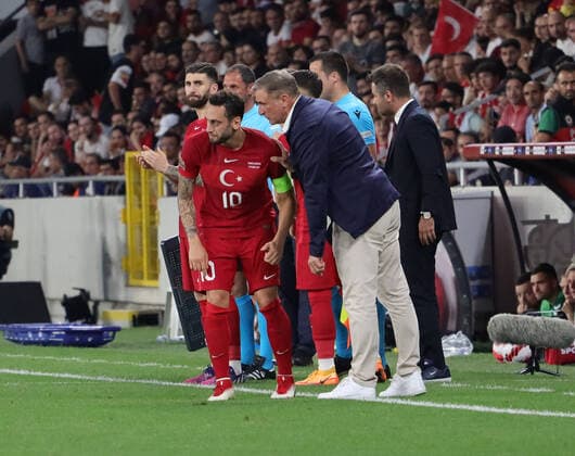 Coach Stefan Kuntz and Hakan Calhanoglu of Turkey during the UEFA Nations League League C Group 1 match between Turkey and Lithuania at Gursel Aksel Stadium in Izmir, Turkey on June 14, 2022. ( Photo by Seskimphoto ) 