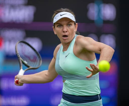 15th June 2022; Edgbaston Priory Club, Edgbaston, Birmingham, United Kingdom; Birmingham Classic Lawn Tennis tournament; Simona Halep (ROU) in her match against Harriet Dart (GBR)  ActionPlus12400181 RogerxEvans