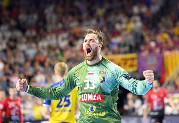 Cheering goalkeeper Andreas WOLFF Kielce , Handball Champions League Final Four, Semifinal, Telekom Veszprem HC vs Lomza Vive Kielce, on 18 06 2022 in Cologne Germany Â