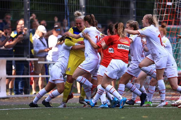 Promotion match 2 Womens Bundesliga 2021 2022, 1 FC Köln II 1 FC Saarbrücken 1 FC Köln II cheers after winning penalty shootout Cologne RheinEnergieSportpark, artificial turf North Rhine Westphalia Germany