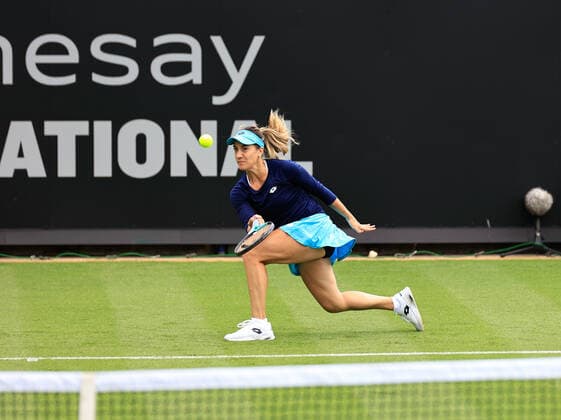 19th June 2022, Devonshire Park, Eastbourne, England; Rothesy International WTA, Tennis Damen 500 series Lawn Tennis Tournament; Kaia Kanepi (EST) plays a backhand against Nuria Parrizas Diaz (ESP)  ActionPlus12401391 HongboxChen