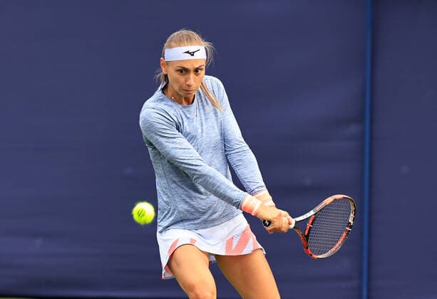 19th June 2022, Devonshire Park, Eastbourne, England; Rothesy International WTA, Tennis Damen 500 series Lawn Tennis Tournament; Aleksandra Krunic (SBR) plays a backhand against Rebecca Marino (Can)  ActionPlus12401628 HongboxChen