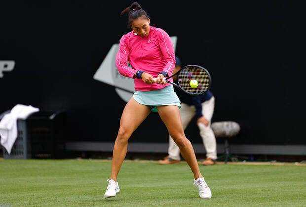 19th June 2022, Devonshire Park, Eastbourne, England; Rothesy International WTA, Tennis Damen 500 series Lawn Tennis Tournament; Qinwen Zheng (CHN) plays backhand against Magdalena Frech (POL)  ActionPlus12401640 HongboxChen
