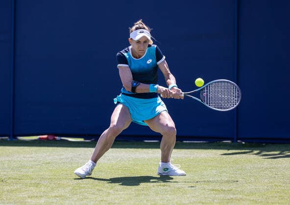 20th June 2022, Devonshire Park, Eastbourne, England; Eastbourne International Lawn Tennis Tournament; Lesia Tsurenko (UKR) plays a backhand against Camila Osorio (COL)  ActionPlus12401676 HongboxChen