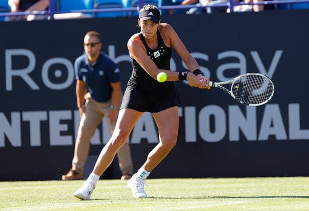 20th June 2022, Devonshire Park, Eastbourne, England; Eastbourne International Lawn Tennis Tournament; Garbine Muguruza (ESP) plays a backhand against Magdalena Frech (POL)  ActionPlus12401813 HongboxChen