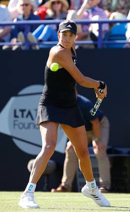 20th June 2022, Devonshire Park, Eastbourne, England; Eastbourne International Lawn Tennis Tournament; Garbine Muguruza (ESP) plays a backhand against Magdalena Frech (POL)  ActionPlus12401815 HongboxChen