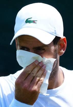 Mandatory Credit: Photo by Javier Garcia Shutterstock (12994278e) Novak Djokovic blows his nose Wimbledon Tennis Championship Practice and Previews, The All England Lawn Tennis and Croquet Club, London, UK - 21 Jun 2022 Wimbledon Tennis Championship Practice and Previews, The All England Lawn Tennis and Croquet Club, London, UK - 21 Jun 2022  Copyright: xJavierxGarcia Shutterstockx 12994278e