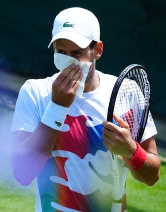 Mandatory Credit: Photo by Javier Garcia Shutterstock (12994278g) Novak Djokovic blows his nose Wimbledon Tennis Championship Practice and Previews, The All England Lawn Tennis and Croquet Club, London, UK - 21 Jun 2022 Wimbledon Tennis Championship Practice and Previews, The All England Lawn Tennis and Croquet Club, London, UK - 21 Jun 2022  Copyright: xJavierxGarcia Shutterstockx 12994278g