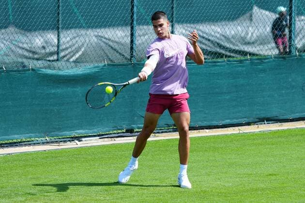 Mandatory Credit: Photo by Javier Garcia Shutterstock (12994278p) Carlos Alcaraz warms up Wimbledon Tennis Championship Practice and Previews, The All England Lawn Tennis and Croquet Club, London, UK - 21 Jun 2022 Wimbledon Tennis Championship Practice and Previews, The All England Lawn Tennis and Croquet Club, London, UK - 21 Jun 2022  Copyright: xJavierxGarcia Shutterstockx 12994278p