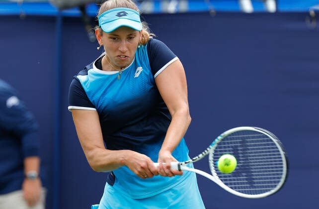21st June 2022, Devonshire Park, Eastbourne, England; Eastbourne International Lawn Tennis Tournament; Elise Mertens (BEL) plays a backhand against Kirsten Flipens (BEL)  ActionPlus12401851 HongboxChen