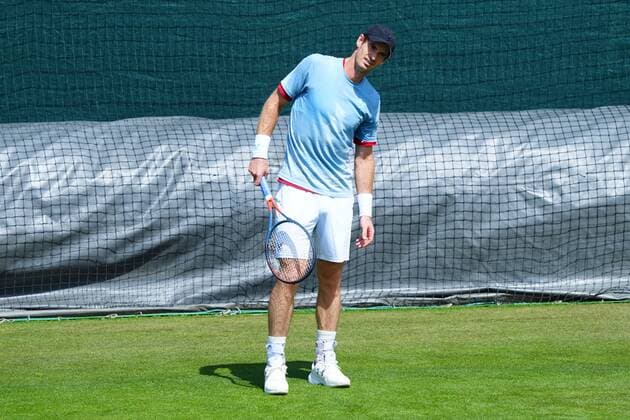 Mandatory Credit: Photo by Javier Garcia Shutterstock (12994278dr) Andy Murray flexes his side during training Wimbledon Tennis Championship Practice and Previews, The All England Lawn Tennis and Croquet Club, London, UK - 21 Jun 2022 Wimbledon Tennis Championship Practice and Previews, The All England Lawn Tennis and Croquet Club, London, UK - 21 Jun 2022  Copyright: xJavierxGarcia Shutterstockx 12994278dr