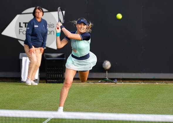 21st June 2022, Devonshire Park, Eastbourne, England; Eastbourne International Lawn Tennis Tournament; Paula Badodsa (ESP) plays a backhand against Jodie Burrage (GBR)  ActionPlus12401910 HongboxChen