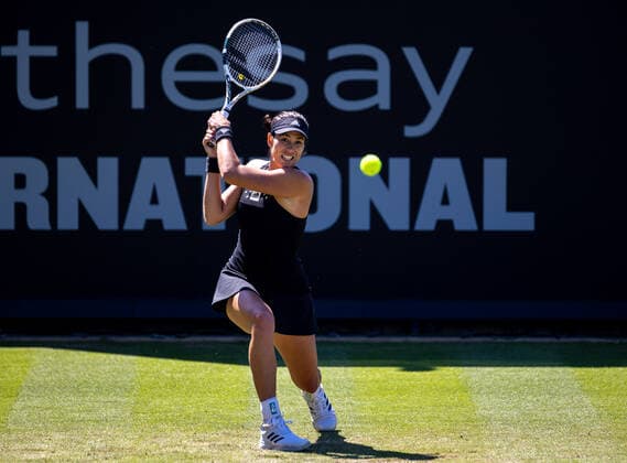 22nd June 2022, Devonshire Park, Eastbourne, England; Eastbourne International Lawn Tennis Tournament; Garbine Muguruza (ESP) plays a backhand against Camila Giorgi (ITA)  ActionPlus12401944 HongboxChen