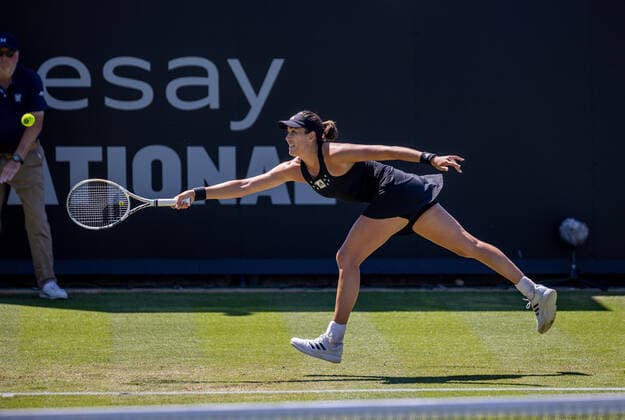 22nd June 2022, Devonshire Park, Eastbourne, England; Eastbourne International Lawn Tennis Tournament; Garbine Muguruza (ESP) plays a forehand against Camila Giorgi (ITA)  ActionPlus12401946 HongboxChen
