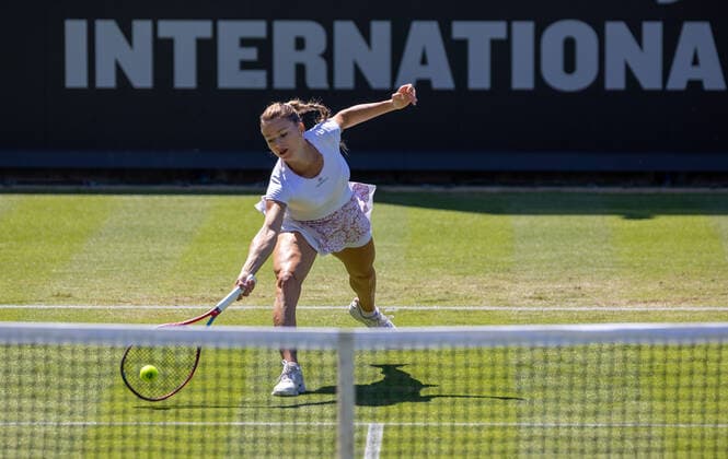 22nd June 2022, Devonshire Park, Eastbourne, England; Eastbourne International Lawn Tennis Tournament; Camila Giorgi (ITA) plays a forehand against Garbine Muguruza (ESP)  ActionPlus12401950 HongboxChen
