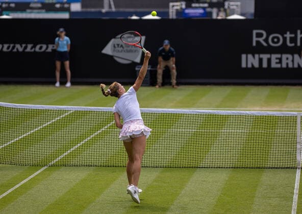 23rd June 2022, Devonshire Park, Eastbourne, England; Eastbourne International Lawn Tennis Tournament; Camila Giorgi (ITA) plays a forehand against Viktoriya Tomova (BUL)  ActionPlus12402062 HongboxChen