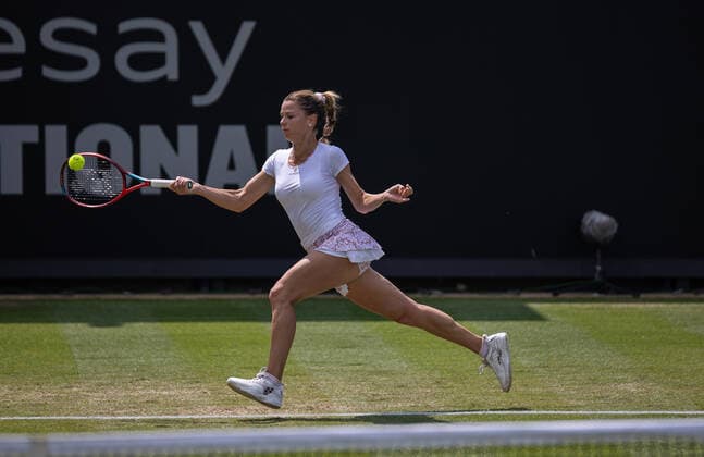 23rd June 2022, Devonshire Park, Eastbourne, England; Eastbourne International Lawn Tennis Tournament; Camila Giorgi (ITA) plays a forehand against Viktoriya Tomova (BUL)  ActionPlus12402063 HongboxChen