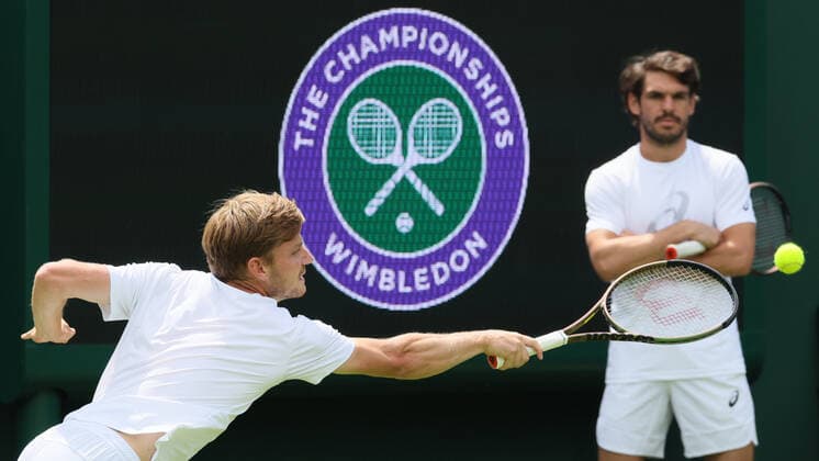 Belgian David Goffin and Goffin s coach Germain Gigounon pictured during a training session ahead of the 2022 Wimbledon grand slam tennis tournament at the All England Tennis Club, in south-west London, Britain, Friday 24 June 2022. BENOITxDOPPAGNE  x36598678x