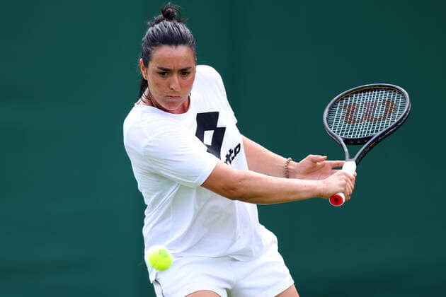 25th June 2022, All England Lawn Tennis and Croquet Club, London, England; Wimbledon Tennis tournament; Ons Jabeur plays a backhand during her practice session with Serena Williams  ActionPlus12402284 ShaunxBrooks