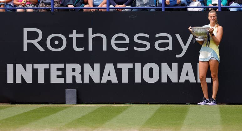 25th June 2022, Devonshire Park, Eastbourne, England; Eastbourne International Lawn Tennis Tournament finals; Petra Kvitova (CZE) celebrates with the winner& x2019;s trophy after the womens singles final  ActionPlus12402332 HongboxChen