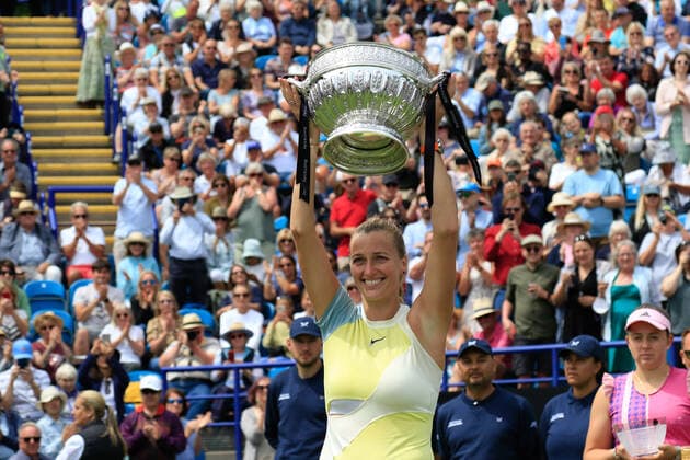 25th June 2022, Devonshire Park, Eastbourne, England; Eastbourne International Lawn Tennis Tournament finals; Petra Kvitova (CZE) celebrates with the winner& x2019;s trophy after the womens singles final  ActionPlus12402335 HongboxChen