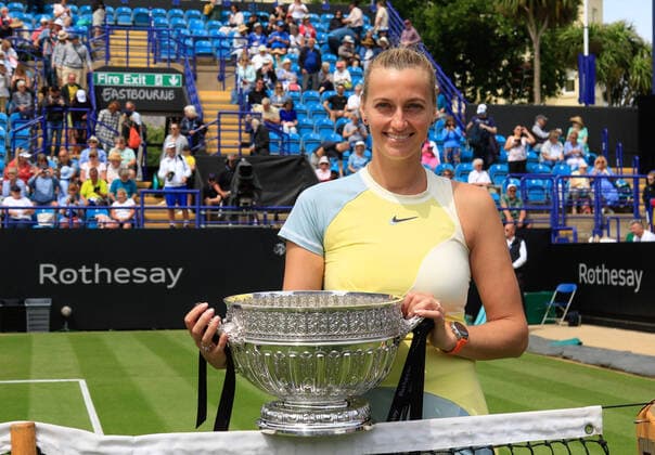 25th June 2022, Devonshire Park, Eastbourne, England; Eastbourne International Lawn Tennis Tournament finals; Petra Kvitova (CZE) celebrates with the winner& x2019;s trophy after the womens singles final  ActionPlus12402340 HongboxChen