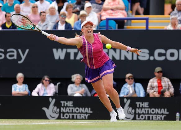 25th June 2022, Devonshire Park, Eastbourne, England; Eastbourne International Lawn Tennis Tournament finals; Jelena Ostapenko (LAT) plays a forehand against Petra Kvitova (CZE) in the womens single final  ActionPlus12402462 HongboxChen