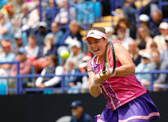25th June 2022, Devonshire Park, Eastbourne, England; Eastbourne International Lawn Tennis Tournament finals; Jelena Ostapenko (LAT) plays a backhand against Petra Kvitova (CZE) in the womens single final  ActionPlus12402468 HongboxChen