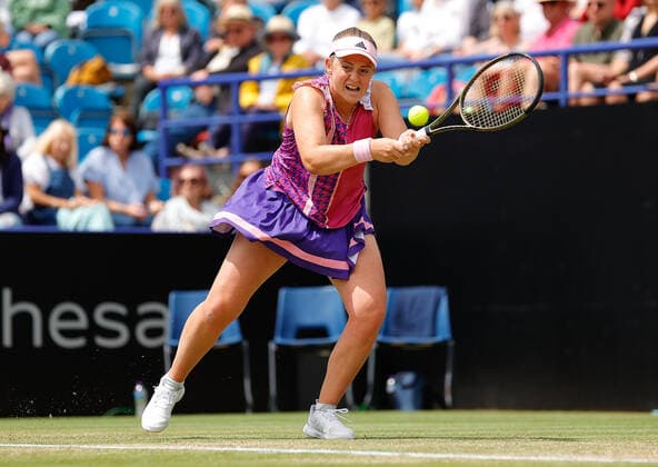 25th June 2022, Devonshire Park, Eastbourne, England; Eastbourne International Lawn Tennis Tournament finals; Jelena Ostapenko (LAT) plays a backhand against Petra Kvitova (CZE) in the womens single final  ActionPlus12402470 HongboxChen