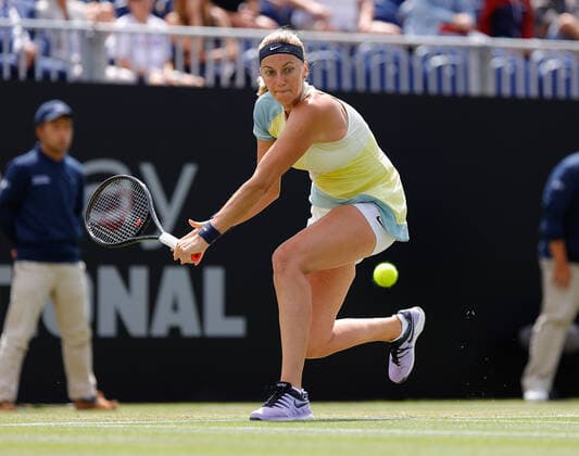 25th June 2022, Devonshire Park, Eastbourne, England; Eastbourne International Lawn Tennis Tournament finals; Petra Kvitova (CZE) plays a backhand against Jelena Ostapenko (LAT) in the womens single final  ActionPlus12402475 HongboxChen