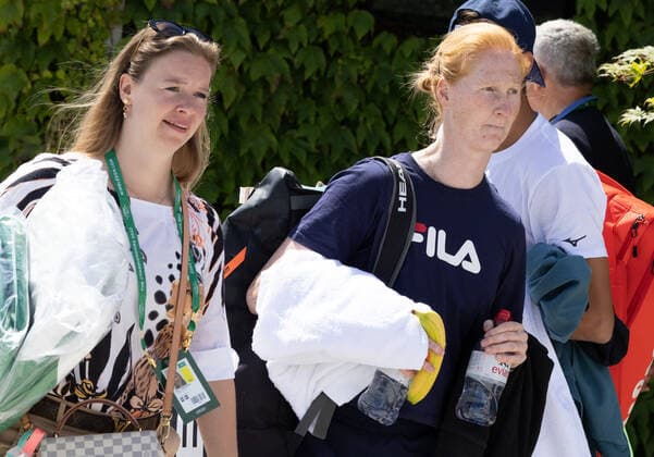Emilie Vermeiren and Belgian Alison Van Uytvanck pictured during the 2022 Wimbledon grand slam tennis tournament at the All England Tennis Club, in south-west London, Britain, Sunday 26 June 2022. BENOITxDOPPAGNE  x36659609x